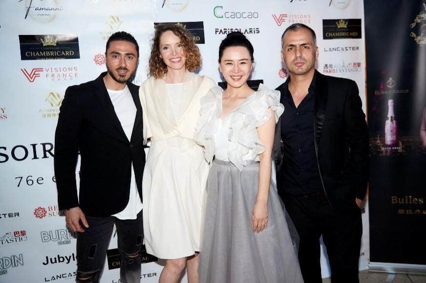 Wang Xuan (second from right) with actress Laura Weissbecker (second from left) and director Mustafa (right) at Cannes